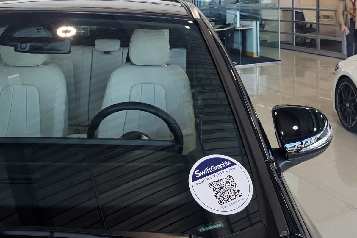 QR sticker close-up on luxury vehicle